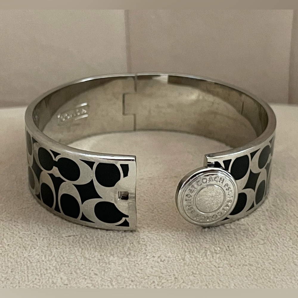 Coach signature C silver & black enamel hinged bangle bracelet